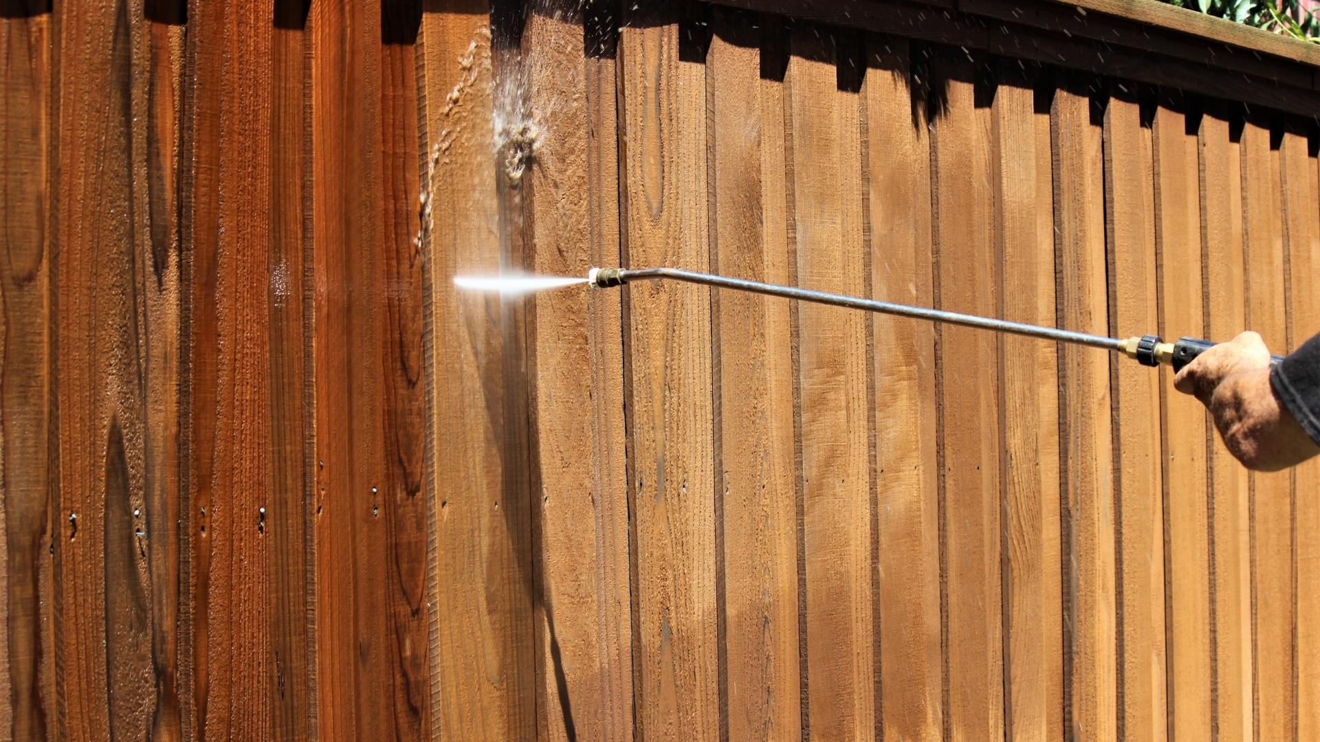 professional pressure washing wooden fence