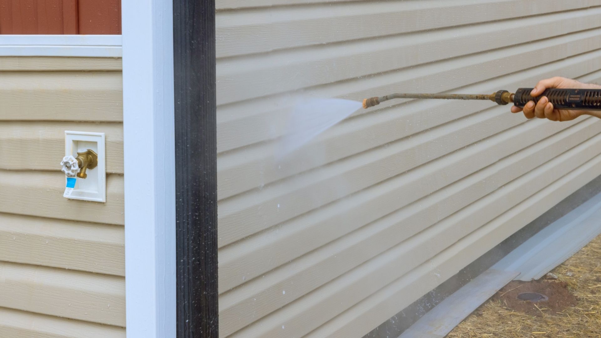 up close view of a professional pressure wash of home